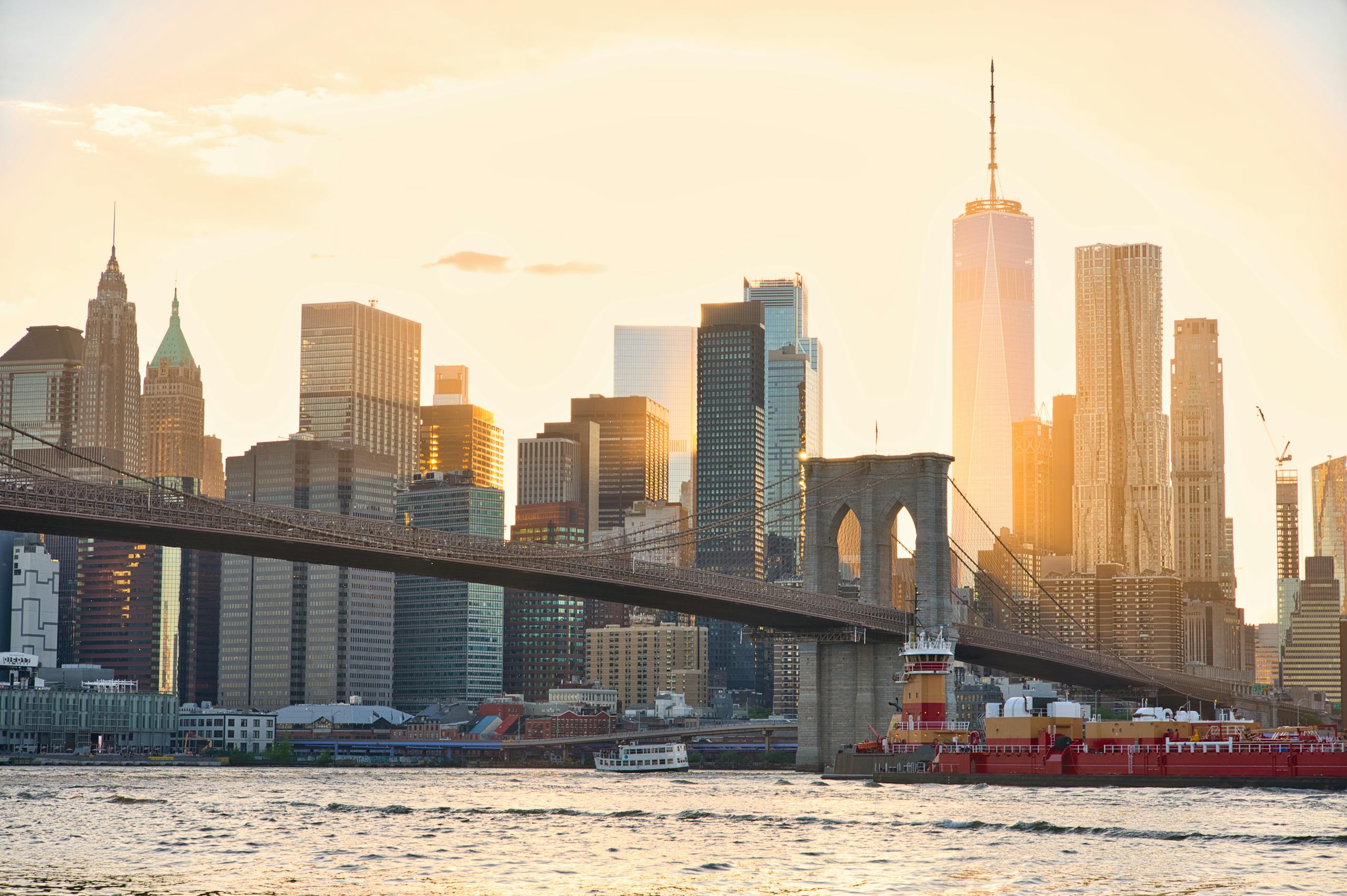 Brooklyn Bridge and NYC skyline at sunset