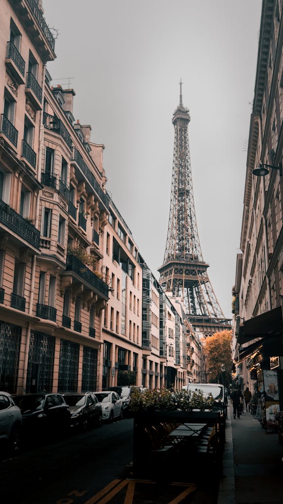 Captivating street view of the Eiffel Tower in Paris, showcasing classic architecture.