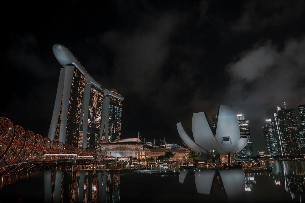 Stunning night view of Marina Bay Sands with reflections in Singapore's skyline.