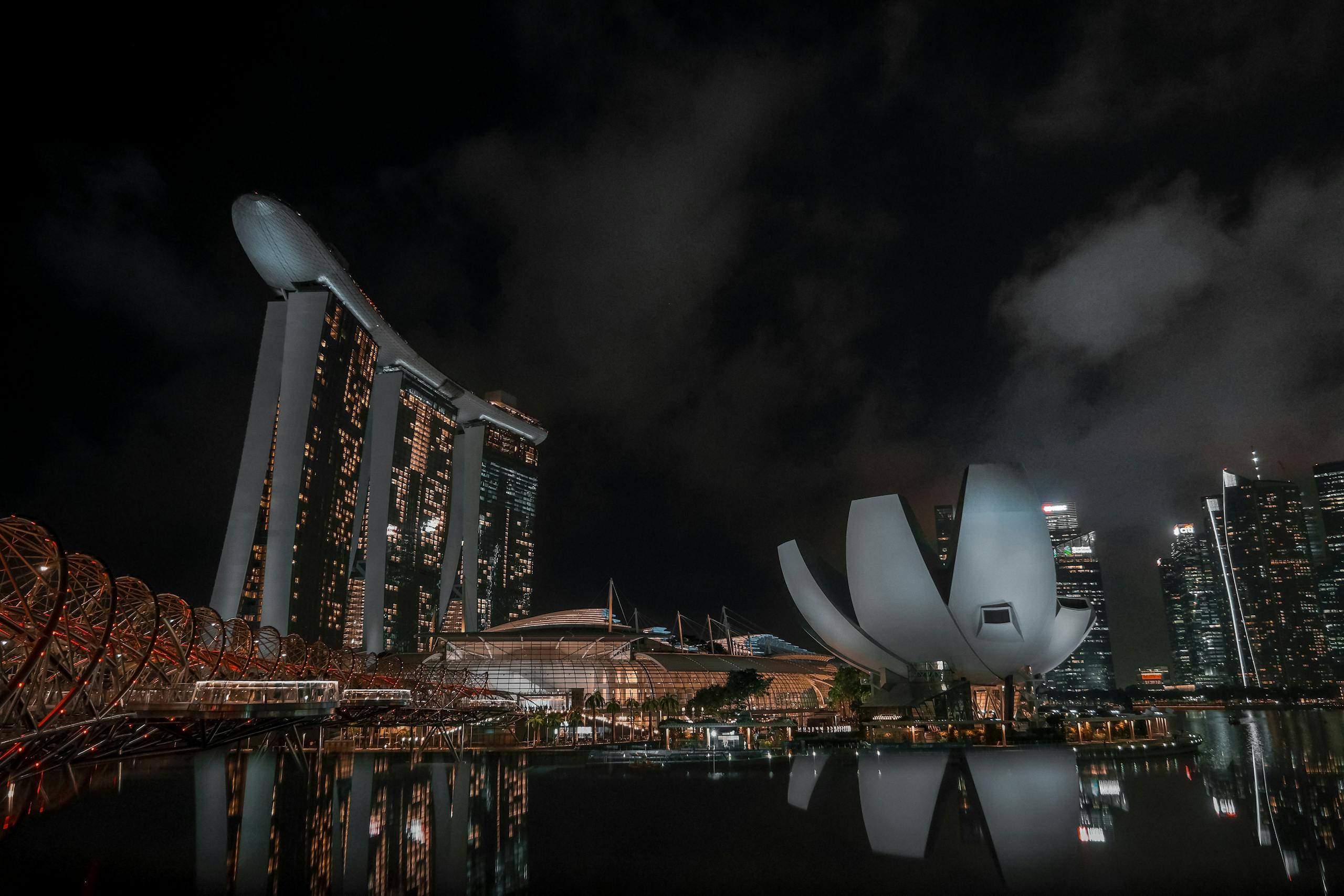 Stunning night view of Marina Bay Sands with reflections in Singapore's skyline.